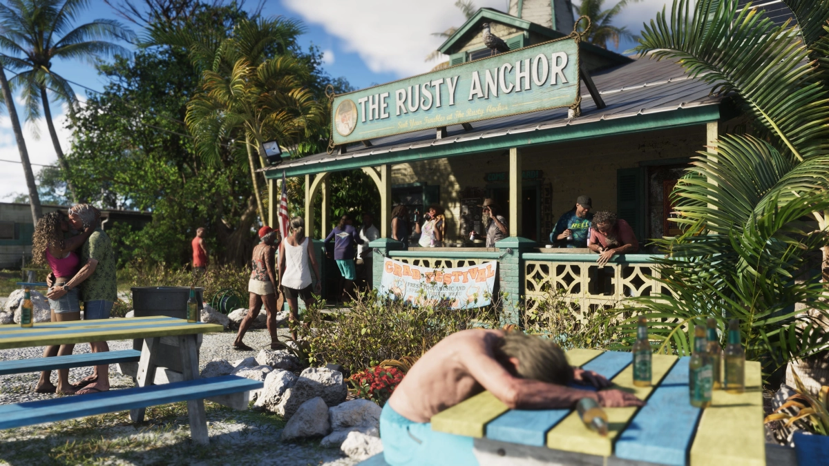The exterior of a beach bar in the Leonida Keys with many people: a man sits at a picnic table passed out surrounded by empty bottles, a couple is kissing, people are walking into the entrance, and others are hanging out on the front porch. The exterior of a beach bar in the Leonida Keys with many people: a man sits at a picnic table passed out surrounded by empty bottles, a couple is kissing, people are walking into the entrance, and others are hanging out on the front porch.