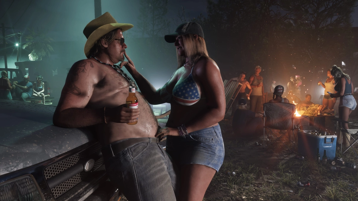 People gathered at a bonfire in Port Gellhorn. One couple is off to the side with the man leaning back on the hood of a truck and the woman putting her finger to his mouth while reaching for his belt. People gathered at a bonfire in Port Gellhorn. One couple is off to the side with the man leaning back on the hood of a truck and the woman putting her finger to his mouth while reaching for his belt.