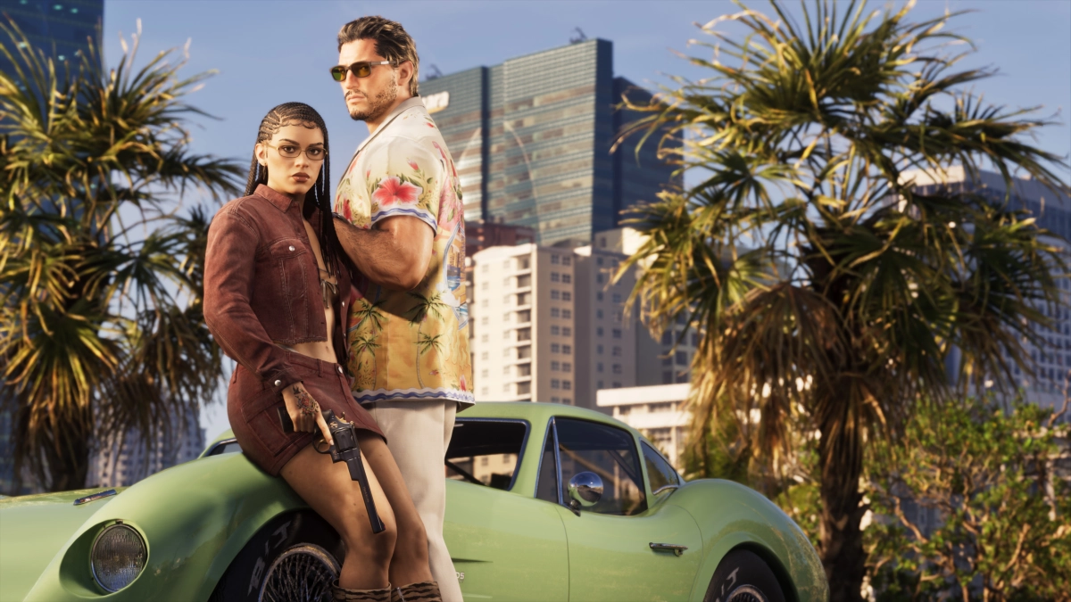 Jason and Lucia leaning against a green car in front of palm trees and a distant skyline.