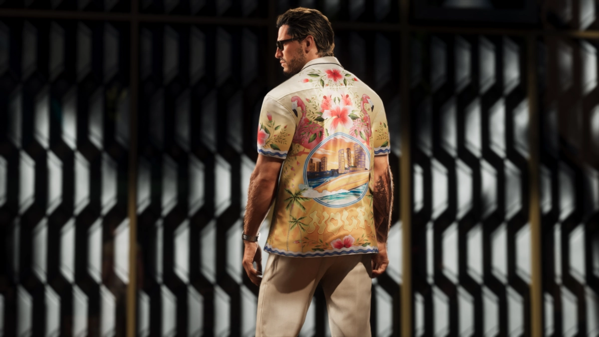 Jason posing with his back turned, dressed in a tropical shirt and beige pants.
